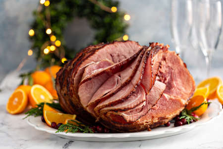 Spiral sliced Christmas ham with orange honey glazeの写真素材