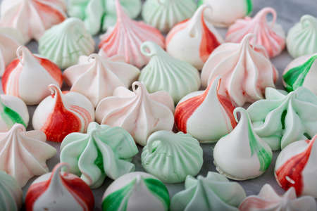 Peppermint meringues on a marble table, Christmas treatの写真素材