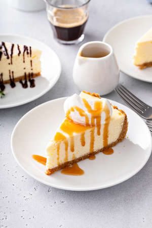 Classic New York cheesecake with a dollop of whipped creamの写真素材