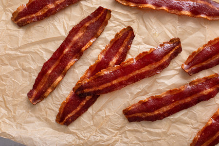 Turkey bacon crispy cooked on parchment paperの写真素材