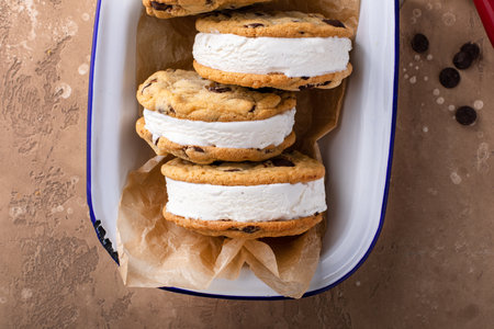 Ice cream sandwiches with vanilla ice cream and chocolate chip cookies, homemade sweet treatの写真素材