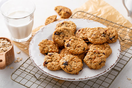 Healthy breakfast cookies with oatmeal, pecans and dried cranberryの写真素材