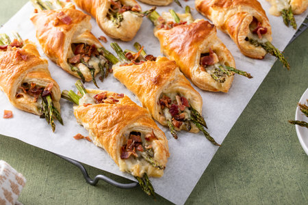 Puff pastry asparagus, cheddar and bacon tarts for breakfastの写真素材