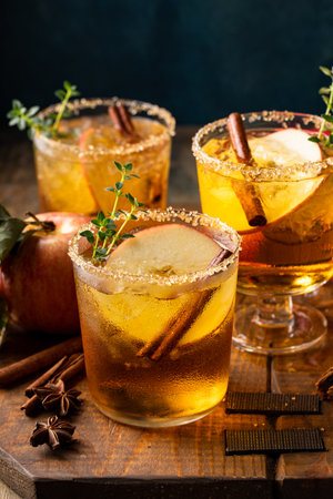 Apple cider margaritas with thyme and fall spices, fall or winter cocktail ideaの写真素材