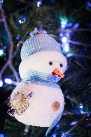 Snowman on the Christmas Treeの写真素材