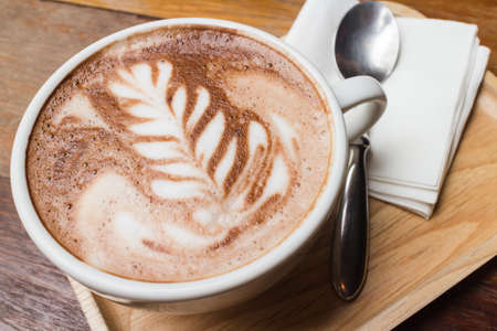 Cup of coffee with beautiful artの写真素材