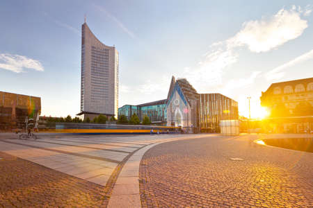 On Augustusplatz in Leipzig with a view of the university and the city skyscraper.のeditorial素材