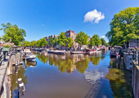 Amsterdam is famous for its canals, especially in summer with the bright colors of the flowers and lots of bicycles.のeditorial素材
