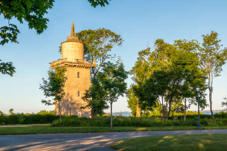 Beautiful view of the historic water tower in  Harkness Memorial State Park, Connecticut, USA, on sunsetの写真素材