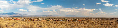 Southwest living. Albuquerque Metro Area Residential Panorama with the view of the Sandia Mountains in the distance. Petroglyph National Monument, New Mexicoの写真素材