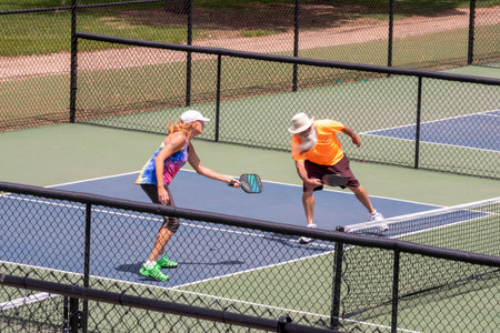Colorado Springs, Colorado - May 15, 2021: tennis players playing doubles in the tennis court of Monument Valley Park, Colorado Springs, Coloradoのeditorial素材