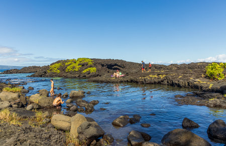 Hilo, Hawaii - November 27, 2021: Richardson Ocean Park on Big Island, Hawaii. People enjoy the beachのeditorial素材