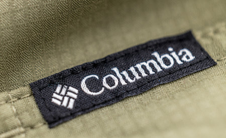 Denver, Colorado - May 10, 2022: Columbia brand label close-up on a gray cotton shirt