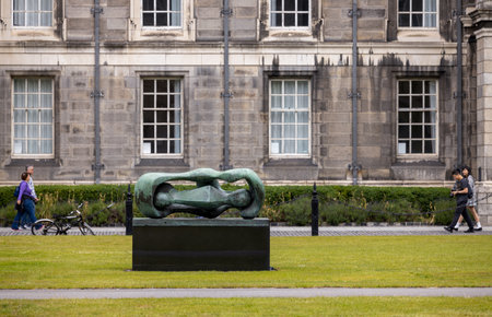 Dublin, Ireland - June 2, 2022: The bronze sculpture of Henry Moore 'Reclining Connected Forms' created in 1969 at Trinity College of Dublin, Irelandのeditorial素材