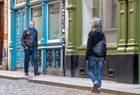 Dublin, Ireland - June 3, 2022: Everyday busy life of tourists and townspeople in Dublin, Ireland. Strangers in Temple Bar.のeditorial素材