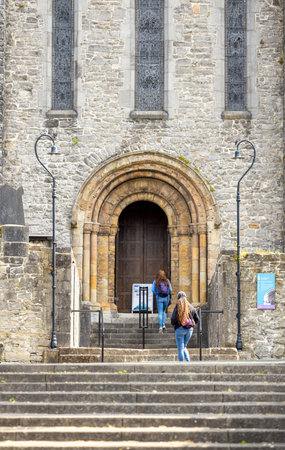 Limerick, Ireland - June 4, 2022: People in the entrance of the old St Mary Cathedral in Limerick, Irelandのeditorial素材