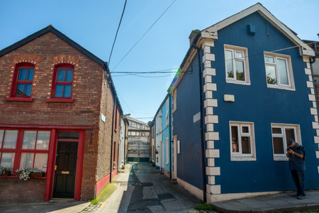 Dublin, Ireland - June 1, 2022: Colorful houses in the center of Dublin, a tourist looking for directionのeditorial素材