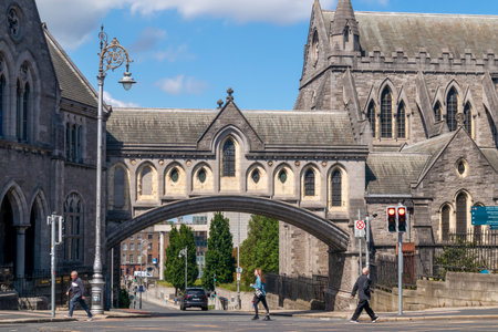 Dublin, Ireland - June 1, 2022: Iconic Bridge and Synod Hall, the building that houses Dublinia, part of Dublin Christ Church Cathedral in Dublin, Irelandのeditorial素材