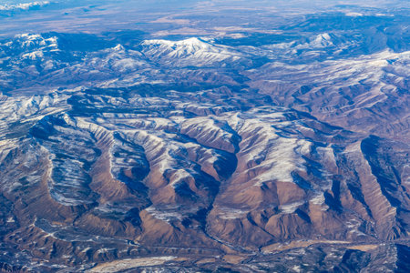 Aerial view of the Rocky Mountains covered by snowの写真素材