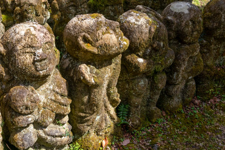 Kyoto, Japan - March 27, 2023: Kawaii little buddhas statues in Otagi Nenbutsu-ji temple in Kyoto, Japanのeditorial素材