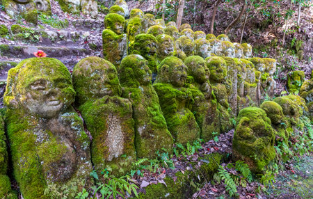 Kyoto, Japan - March 27, 2023: Kawaii little buddhas statues in Otagi Nenbutsu-ji temple in Kyoto, Japanのeditorial素材