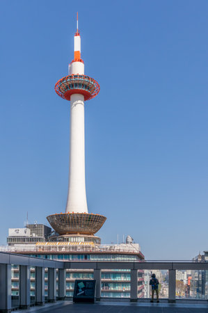 Kyoto, Japan - March 28, 2023: Kyoto Tower viewed from Kyoto Central Station in Kyoto, Japanのeditorial素材