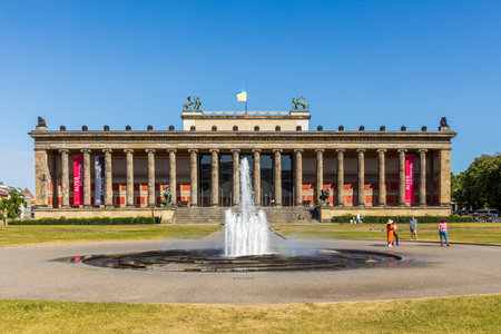 Berlin, Germany - May 30, 2023: Beautiful fountain with a rainbow in front of Altes (Old) Museum on Museum Island, Berlin, Germanyのeditorial素材