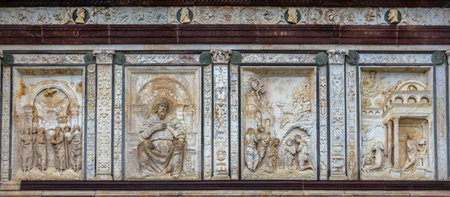 Pavia, Italy - February 27, 2024: Certosa di Pavia, a medieval church and monastery in Pavia, Italy, on a rainy day. Architectural details.のeditorial素材