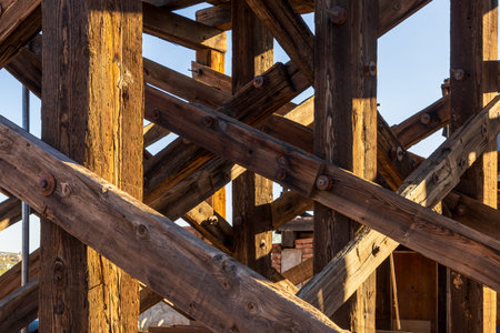 A wooden trestle bridge in Goldfield, later Youngsberg, a gold mining town, now a ghost town in Pinal County, Arizona.の写真素材