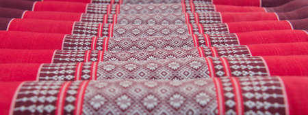 Red patterns of wave pillowの写真素材