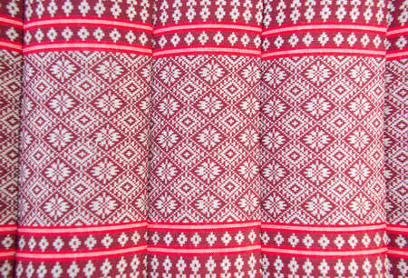 Red patterns of wave pillowの写真素材