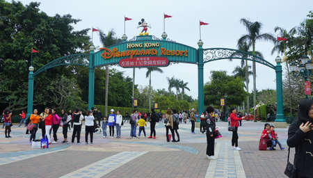 HONG KONG - FEB 18, 2018: The front gate of Disneyland Hong Kong written "Welcome Hong Kong Disneyland Resort"のeditorial素材