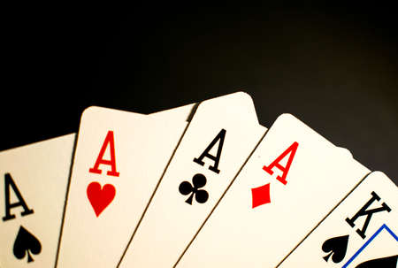 Playing cards in a black background