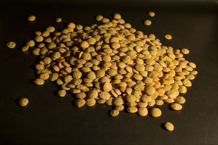 Dried lentils in a darken backgroundの写真素材