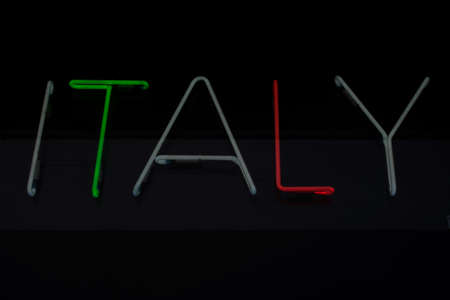 The written Italy made with led lights with colours of italian flagの写真素材