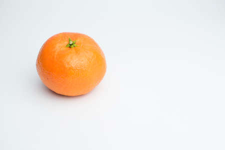 An healthy iolated clementine on a white backgroundの写真素材