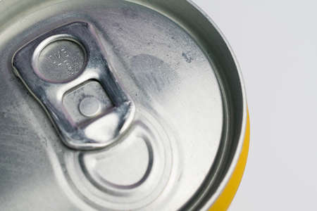 A close up photo of a closed can on a white backgroundの写真素材