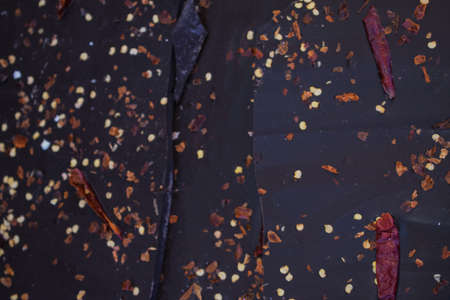 Some pieces of red hot chili pepper dark chocolateの写真素材