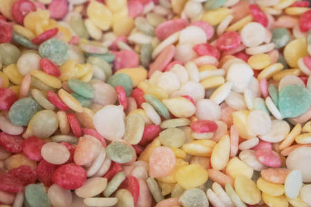 Group of colored candies background in a pastry shopの写真素材