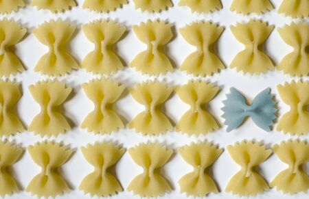 Farfalle pasta pattern with a different oneの写真素材