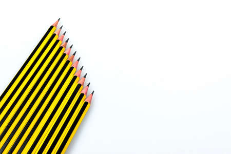 Black and yellow stripes pencil isolated in white backgroundの写真素材