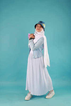 Fashion portrait of young beautiful asian muslim woman with wearing hijab.の写真素材