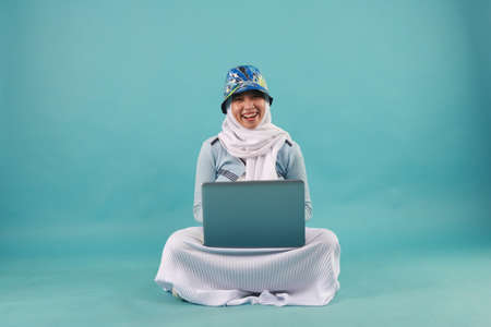 Fashion portrait of young beautiful asian muslim woman with wearing hijab.