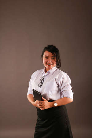 Beautiful sexy asian woman business office style fashion clothes.の写真素材