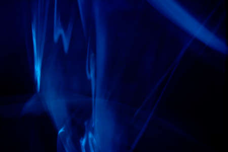 an abstract shot of blue lines looking like smokeの写真素材