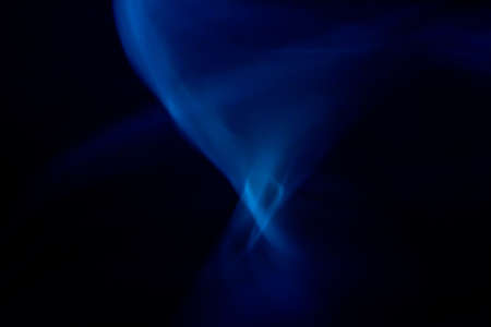 an abstract shot of blue lines looking like smokeの写真素材