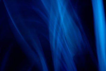 an abstract shot of blue lines looking like smokeの写真素材
