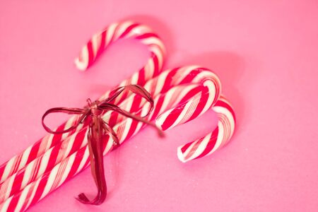 candy canes and Christmas ornaments with shallow depth of fieldの写真素材