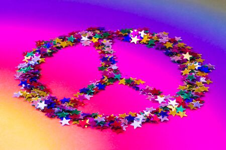 symbol of peace made up of colorful starsの写真素材