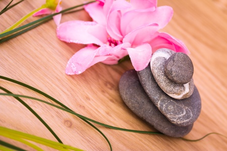 spa stones and flowers representing wellness/beauty careの写真素材